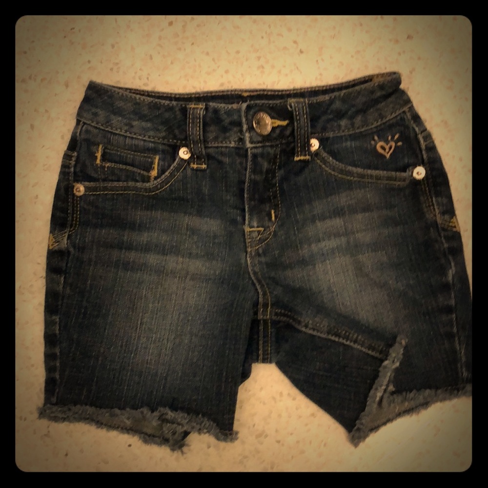 Girls Justice denim cut-off shorts.  Size:8 slim